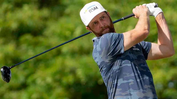 Chris Kirk watches a drive at the 2023 Sony Open in Hawaii.